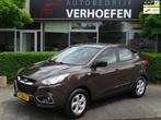 Hyundai Ix35 1.6i GDI Active - AIRCO - AUX - NAVIGATIE - INC, Auto's, Hyundai, Voorwielaandrijving, Gebruikt, 4 cilinders, Bruin