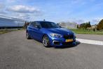 BMW M140i 340pk Centennial High Executive, Achterwielaandrijving, 74 €/maand, Zwart, Blauw