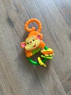 Heel goed: Oranje Fisherprice aap bijtring rammelaar Fisher, Ophalen of Verzenden, Rammelaar, Zo goed als nieuw