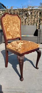 Antieke stoel met houtsnijwerk, Ophalen