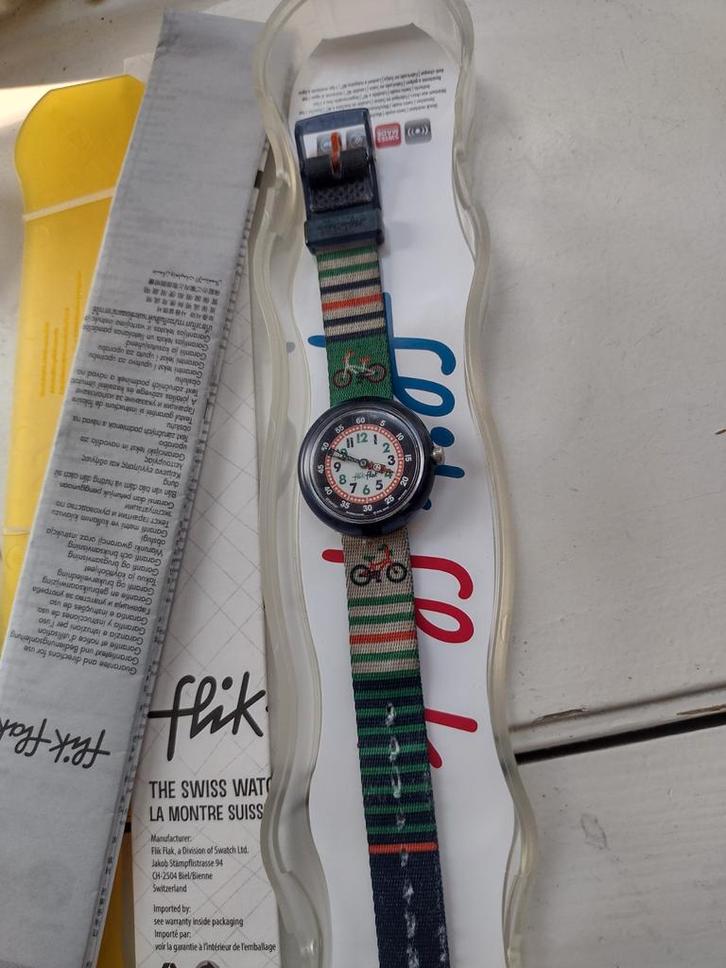 Flik Flak kinderhorloge met fiets motief, Sieraden, Tassen en Uiterlijk, Horloges | Kinderen, Zo goed als nieuw, Jongen of Meisje