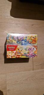 Prismatic evolutions minitins display, Ophalen of Verzenden, Nieuw, Boosterbox, Foil
