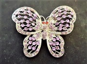 Grote broche vlinder met lila strass beschikbaar voor biedingen