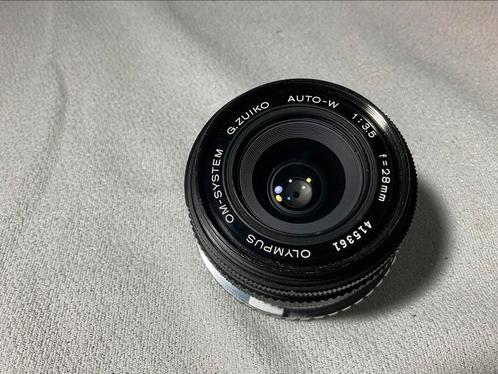 Super mooie OLYMPUS OM G.ZUIKOAUTO-W 1:3.5-28mm lens, Audio, Tv en Foto, Fotografie | Lenzen en Objectieven, Zo goed als nieuw