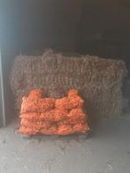 Voederwortels verpakt in zak, Ophalen