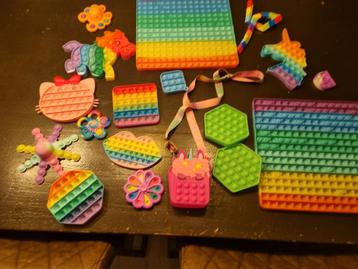 Fidgetspeeltjes pop it beschikbaar voor biedingen