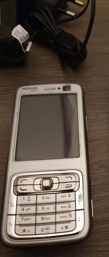 vintage Nokia N73 met oplader , perfecte staat beschikbaar voor biedingen