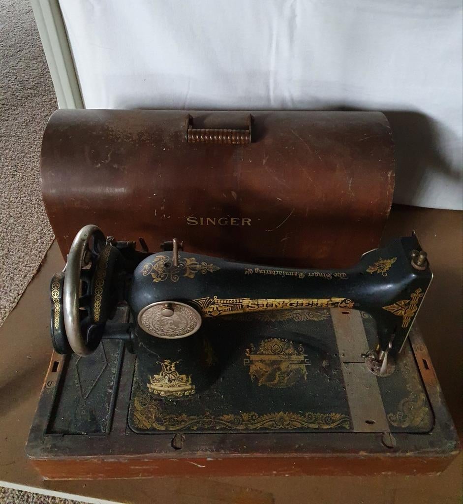 Oude naaimachine Singer, Ophalen