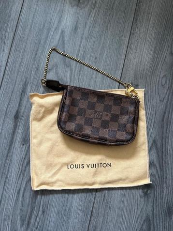 Louis Vuitton mini pochette damier beschikbaar voor biedingen