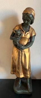 Bronzen beeld van meisje met kat, Ophalen