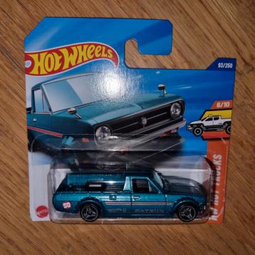 493 - Hotwheels Datsun Sunny Truck in verpakking.  beschikbaar voor biedingen