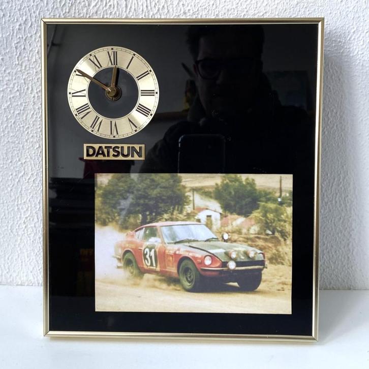 Datsun reclameklok, Verzamelen, Automerken, Motoren en Formule 1, Auto's, Verzenden