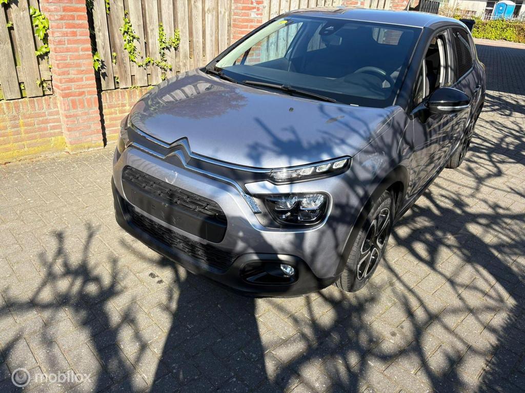 Citroen C3 1.2 PureTech Shine Business met lichte schade, Auto diversen, Schadeauto's, 1199 cc, -, Handgeschakeld, Zilver of Grijs