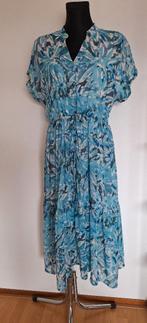 Super aparte jurk Merk Leo Ugo maat 4  42 - 44, Leo & Ugo, Maat 42/44 (L), Zo goed als nieuw, Onder de knie