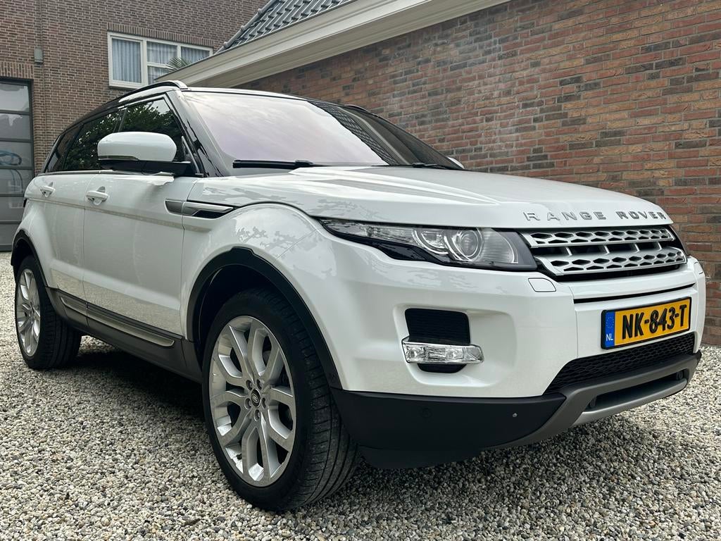 Land Rover Range Rover Evoque SI4 4WD AUT 2011 Wit, Auto's, Automaat, 1800 kg, 4 cilinders, Wit