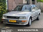 Nissan Bluebird 2.0 SLX Youngtimer/Automaat/Nette, Auto's, Nissan, Stof, Gebruikt, Overige modellen, 4 cilinders