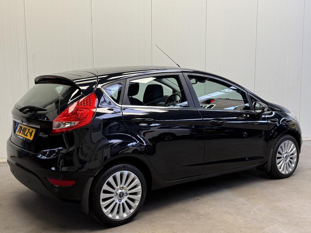 Ford Fiesta 1.25 Titanium AIRCO/ECC-LMV-CRUISE CONTROL-PDC-5, Auto's, Voorwielaandrijving, Stof, Met garantie (alle), 82 pk