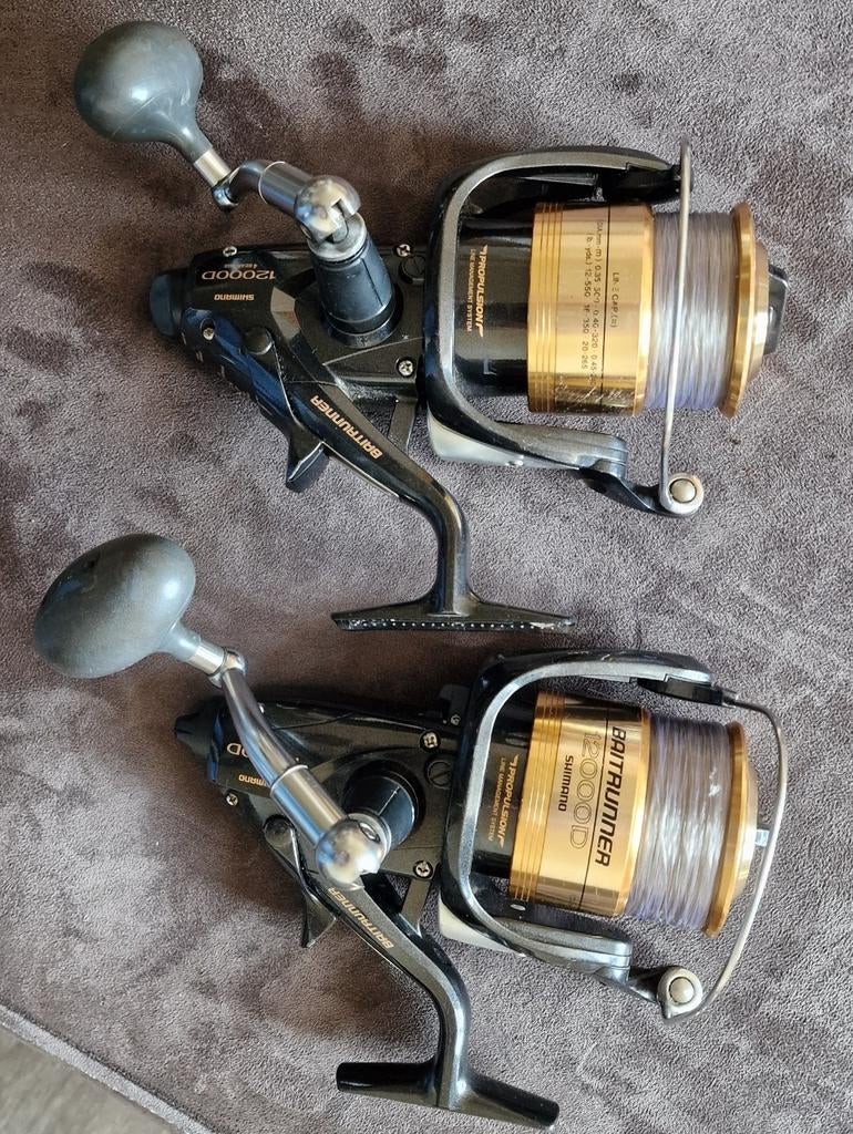 Shimano baitrunner usa 12000D   2 stuks Z.G.A.N, Ophalen, Zo goed als nieuw, Molen