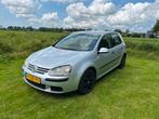 Volkswagen golf 5 2004 Grijs, Auto's, 74 pk, 4 cilinders, 610 kg, Leder
