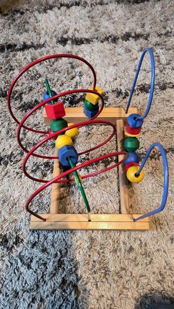 Houten blokken spiraal speelgoed beschikbaar voor biedingen