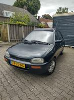 Mazda 121 bolhoed cabrio, Auto's, Mazda, Voorwielaandrijving, Stof, 4 cilinders, Overige kleuren