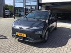 Hyundai Kona EV Fashion 64 kWh, Stof, Gebruikt, 174 min, Grijs