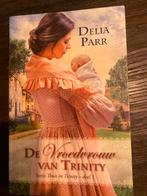 De Vroedvrouw van Trinity - Delia Parr, Boeken, Ophalen of Verzenden, Gelezen