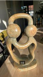 marmeren beeld de Dansers, Ophalen