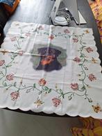 Een mooi kleedje met een Rottweiler erop., Ophalen