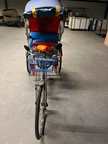 Riksja beschikbaar voor biedingen