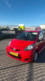 Toyota Aygo 1.0 12V Vvt-i 3DRS MMT 2009 Rood, Auto's, Voorwielaandrijving, 4 stoelen, 68 pk, Bedrijf