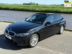 BMW 3-serie Touring 330e High Executive Sportline / panorama, 1998 cc, Achterwielaandrijving, Gebruikt, Zwart