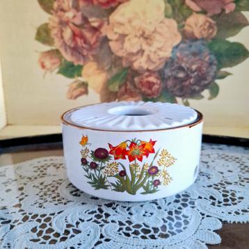 Vintage theelichtje met wilde bloemen beschikbaar voor biedingen