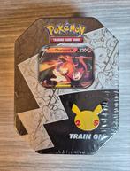 Celebrations: Lance's Charizard V Tin - SEALED, Hobby en Vrije tijd, Verzamelkaartspellen | Pokémon, Ophalen of Verzenden, Nieuw