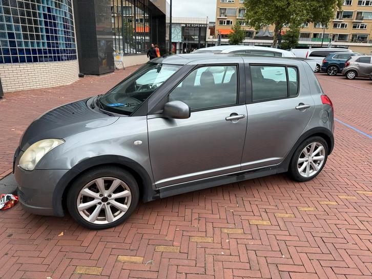 Suzuki Swift 1.3 5D 2006 Grijs, Auto's, Suzuki, Swift, Benzine, C, Hatchback, Handgeschakeld, Origineel Nederlands, Zilver of Grijs