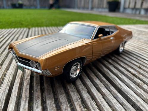 ERTL 1970 Ford Torino Cobra 1:18 goud, Hobby en Vrije tijd, Modelauto's | 1:18, Nieuw, Auto, ERTL, Ophalen of Verzenden