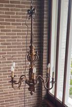 Bronzen kroonluchter, Ophalen