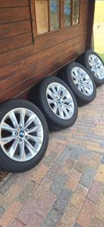 BMW Velgen met Run flat Dunlop Winterbanden 18 inch, Ophalen, Gebruikt