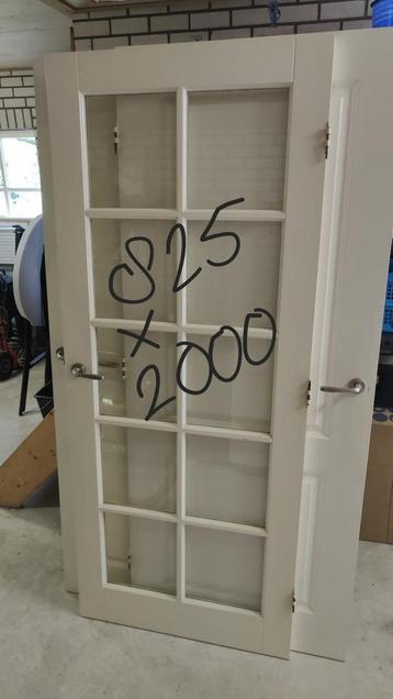 Stompe binnendeur met glas beschikbaar voor biedingen