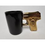 # Mok pistool goud of zilver erg leuk voor op je werk, Huis en Inrichting, Ophalen of Verzenden, Zo goed als nieuw, Overige stijlen