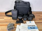 A994. Minolta Dynax 5xi met 28-50mm lens en toebehoren