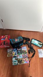 Nintendo Switch OLED rood – compleet met 7 topgames!, Eén computer, Zo goed als nieuw, 3 spelers of meer, Vanaf 7 jaar