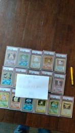 Pokemon kaarten Base unlimited set holo's PSA 8, Ophalen of Verzenden, Zo goed als nieuw, Meerdere kaarten, Foil