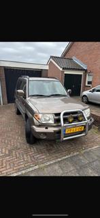 Mitsubishi Pajero 2.0 GDI 5DRS 2003 Bruin, Auto's, Mitsubishi, 74 €/maand, 4 cilinders, Handgeschakeld, Particulier