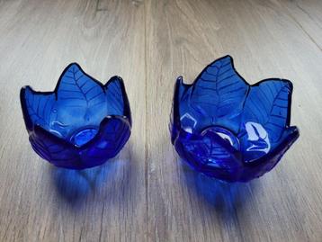 2 zo goed als nieuwe blauwe waxinepotjes beschikbaar voor biedingen