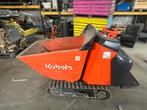 Rupsdumper kubota, Ophalen