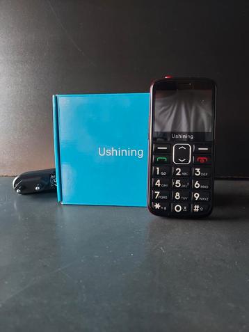 Ushining senioren mobiele telefoon – met doos en oplader beschikbaar voor biedingen