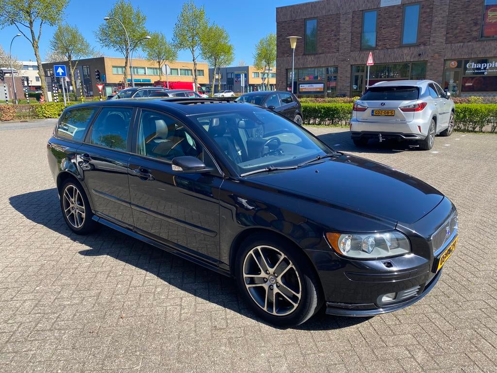 Volvo V50 2.5 T5 AWD Geartronic 2004 Zwart, Auto's, Automaat, Zwart, 700 kg, Vierwielaandrijving