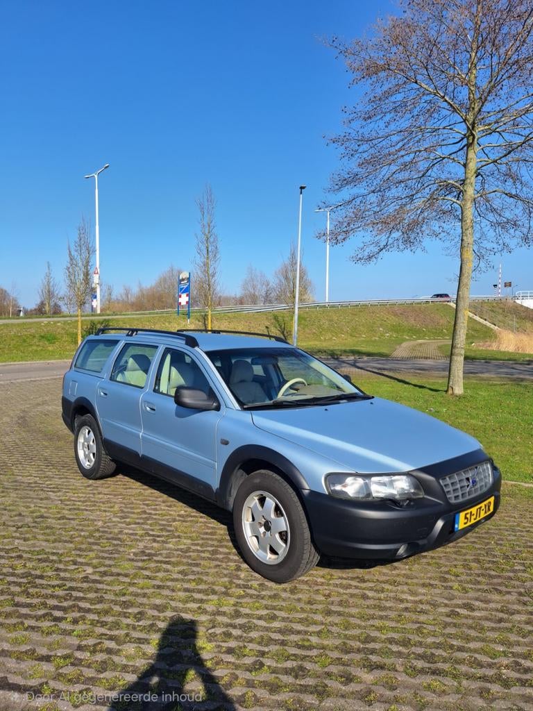 Volvo V70 2.4 T XC 4WD AUT 2002 Blauw, Auto's, Volvo, 1800 kg, Blauw, Stationwagon, 2435 cc