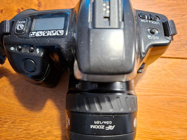 Analoge fotocamera Minolta Dynax 300si

met 35-70 mm lens, Audio, Tv en Foto, Fotocamera's Analoog, Spiegelreflex, Minolta, Ophalen